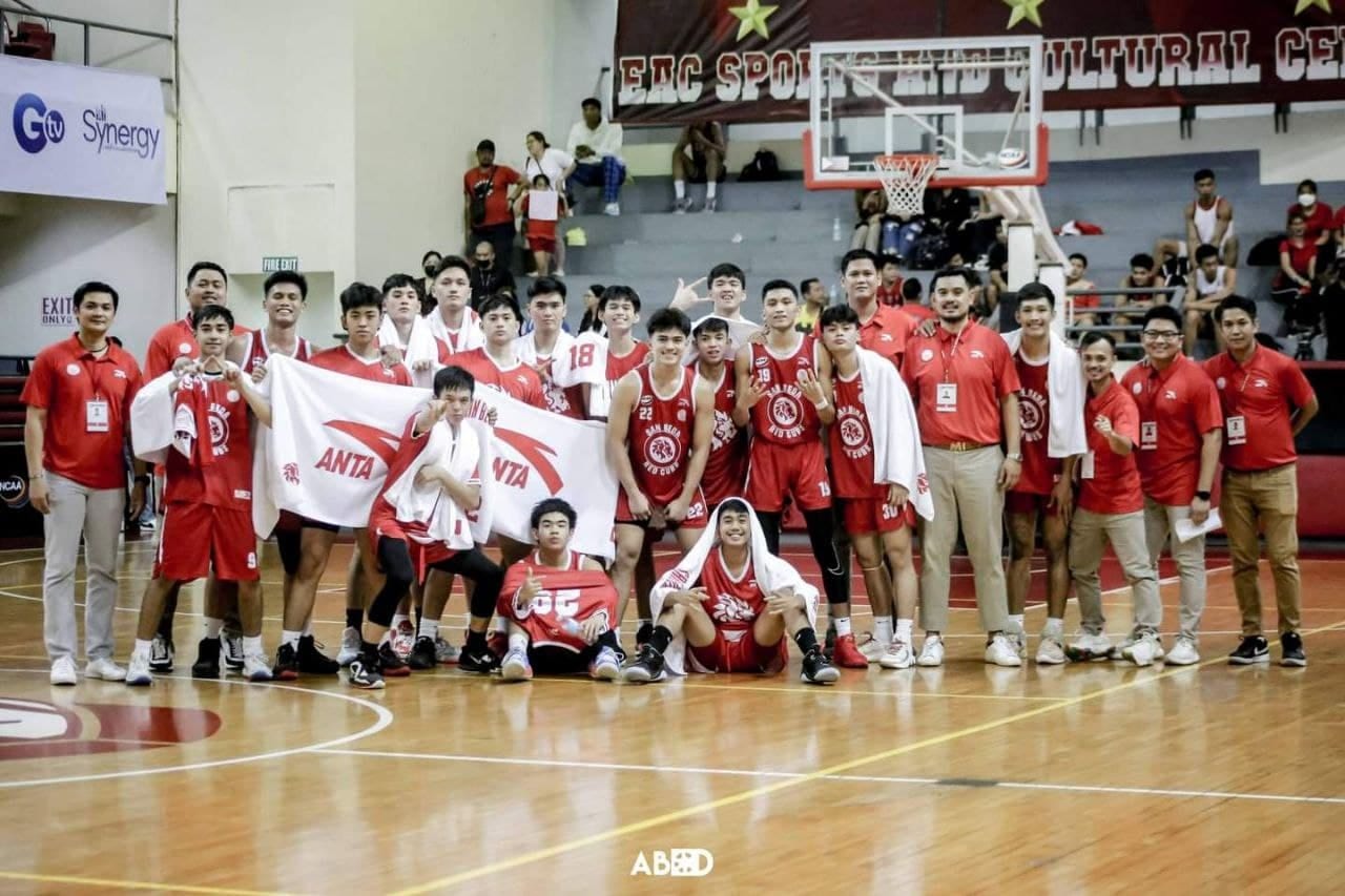 Coach Miko and the San Beda Red Cubs team